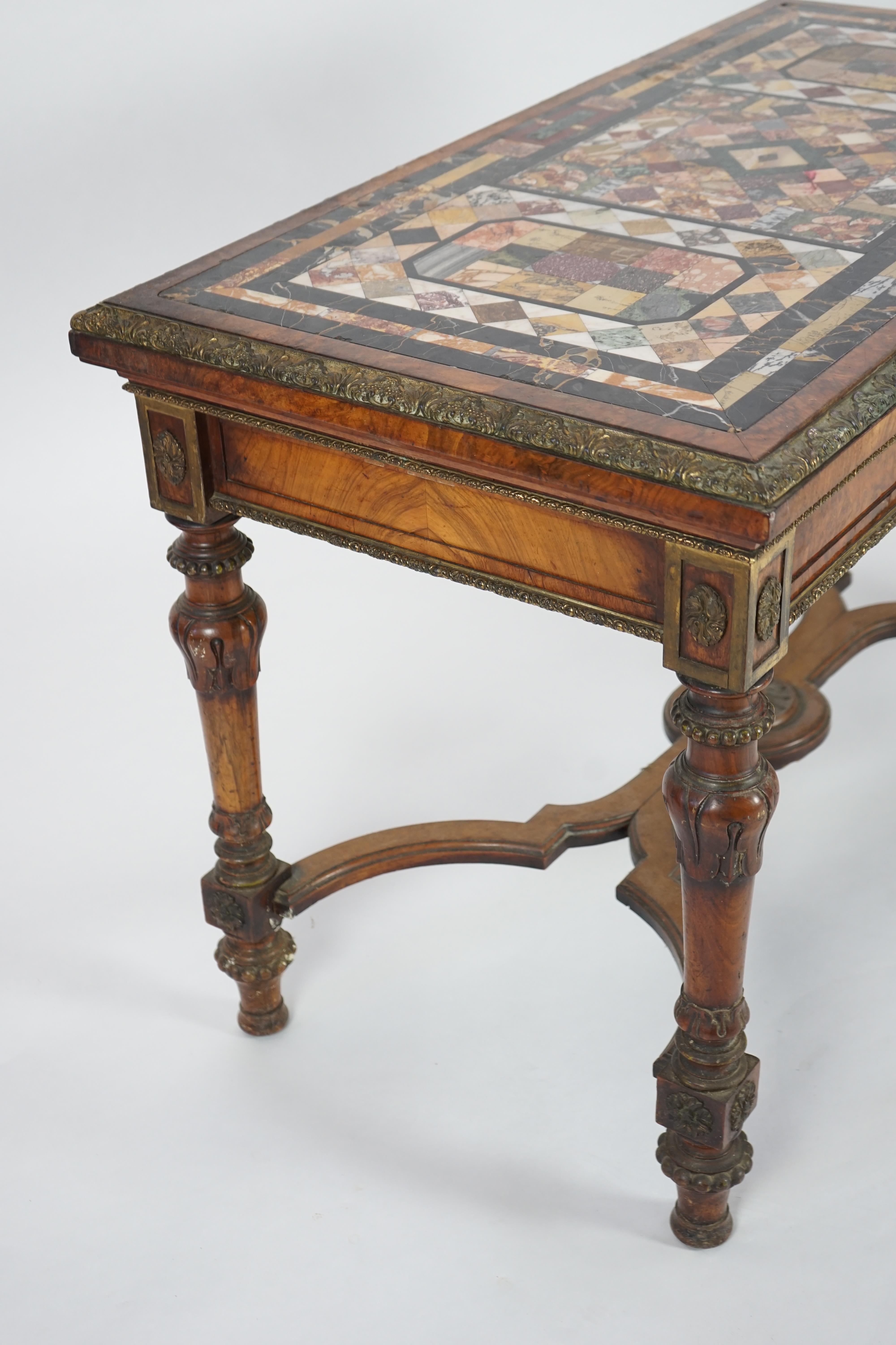 A mid Victorian ormolu mounted walnut pietra dura top centre table